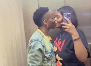 MC Kats And Girlfriend Jojo Share Heartfelf Kiss in an Elevator